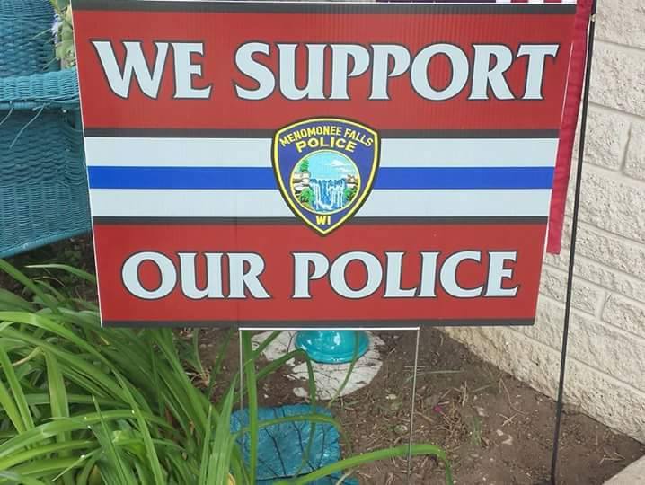 Picture of a sign that reads - We Support Our Police