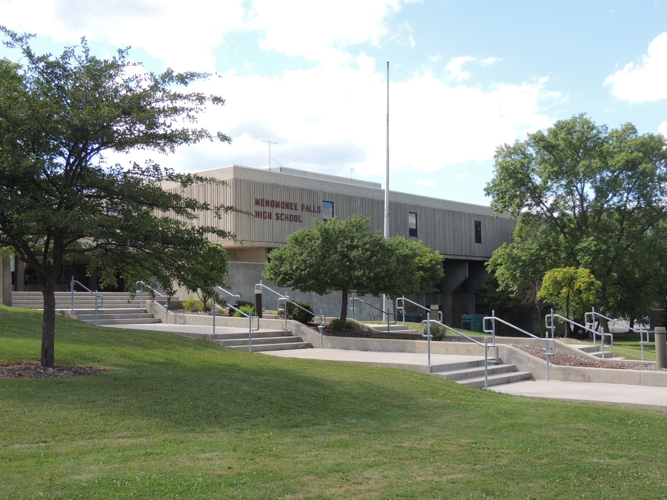 Building with green space and stairs